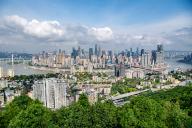 (240424) -- CHONGQING, April 24, 2024 (Xinhua) -- This photo taken on April 23, 2024 shows a view in southwest China\'s Chongqing Municipality. Chongqing is the only municipality in the central and western region of China. Built on mountains and partially surrounded by the Yangtze and Jialing rivers, it is known as a "mountain city" and a "city on rivers". (Xinhua\/Tang Yi