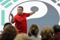 (240427) -- BUCHAREST, April 27, 2024 (Xinhua) -- A Chinese Tai Chi master demonstrates during a lecture themed "feel the beauty of Tai Chi and share the joy of health" at the Chinese Cultural Center in Bucharest, Romania, April 26, 2024. The World Tai Chi Day is celebrated on the last Saturday of April every year. (Photo by Cristian Cristel\/Xinhua