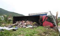 (240428) -- GUANGZHOU, April 28, 2024 (Xinhua) -- A damaged truck after a tornado is seen in Guangming Village of Zhongluotan Town of Baiyun District, Guangzhou, south China\'s Guangdong Province, April 28, 2024. Five people were killed and 33 others injured by a strong tornado that hit Guangzhou, the capital city of south China\'s Guangdong Province, Saturday afternoon, local authorities said. The tornado hit Zhongluotan Town in the city\'s Baiyun District at approximately 3 p.m., while the weather station in Liangtian Village, roughly 2.8 kilometers from the tornado\'s point of occurrence, registered a maximum wind gust of 20.6 meters per second. (Xinhua\/Deng Hua