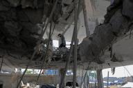 (240503) -- GAZA, May 3, 2024 (Xinhua) -- A man is seen in a destroyed building after an Israeli airstrike in the southern Gaza Strip city of Rafah, on May 3, 2024. The Palestinian death toll from the ongoing Israeli attacks on the Gaza Strip has risen to 34,622, the Gaza health authorities said in a press statement on Friday. (Photo by Rizek Abdeljawad\/Xinhua