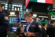 (240503) -- NEW YORK, May 3, 2024 (Xinhua) -- Traders work on the floor of the New York Stock Exchange in New York, the United States, on May 3, 2024. U.S. stocks ended higher on Friday. The Dow Jones Industrial Average rose 450.02 points, or 1.18 percent, to 38,675.68. The S&P 500 added 63.59 points, or 1.26 percent, to 5,127.79. The Nasdaq Composite Index increased by 315.37 points, or 1.99 percent, to 16,156.33. (Photo by Michael Nagle\/Xinhua