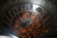 (240505) -- JERUSALEM, May 5, 2024 (Xinhua) -- Orthodox Christian worshipers attend the Holy Fire ceremony at the Church of the Holy Sepulchre in Jerusalem\'s Old City, on May 4, 2024. (Photo by Jamal Awad\/Xinhua