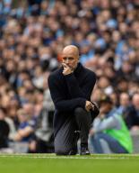(240505) -- MANCHESTER, May 5, 2024 (Xinhua) -- Manchester City\'s manager Pep Guardiola reacts during the English Premier League match between Manchester City and Wolverhampton Wanderers in Manchester, Britain, on May 4, 2024. (Xinhua) FOR EDITORIAL USE ONLY. NOT FOR SALE FOR MARKETING OR ADVERTISING CAMPAIGNS. NO USE WITH UNAUTHORIZED AUDIO, VIDEO, DATA, FIXTURE LISTS, CLUB\/LEAGUE LOGOS OR "LIVE" SERVICES. ONLINE IN-MATCH USE LIMITED TO 45 IMAGES, NO VIDEO EMULATION. NO USE IN BETTING, GAMES OR SINGLE CLUB\/LEAGUE\/PLAYER PUBLICATIONS