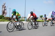 (240506) -- COTONOU, May 6, 2024 (Xinhua) -- Cyclists compete during the 19th International Cycling Tour of Benin in Cotonou, Benin, May 5, 2024. (Photo by Seraphin Zounyekpe\/Xinhua