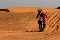 (240506) -- KHAWA, May 6, 2024 (Xinhua) -- A biker competes on a motorcycle circuit race during the 2024 Khawa Dune Challenge and Cultural Festival in Khawa Village of Kgalagadi District, about 700 kilometers southwest of Botswana\'s capital city Gaborone, on May 4, 2024. (Photo by Metlha Ngubevana\/Xinhua