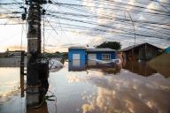 (240506) -- BRAZIL, May 6, 2024 (Xinhua) -- This photo taken on May 5, 2024 shows a view of a flooded street in Novo Hamburgo, Rio Grande do Sul, Brazil. At least 75 people have died from severe storms that inundated large swaths of south Brazil\'s Rio Grande do Sul state since April 29, the Civil Defense agency said in its latest report released Sunday. (Photo by Claudia Martini\/Xinhua