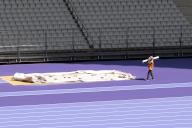 (240508) -- PARIS, May 8, 2024 (Xinhua) -- A worker carries material inside the Stade de France, in Paris, France, on May 7, 2024. (Xinhua\/Xu Zijian