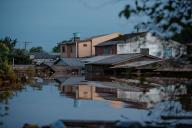 (240508) -- SCHARLAU, May 8, 2024 (Xinhua) -- This photo taken on May 7, 2024 shows a view of a flooded street in Santo Afonso, Novo Hamburgo, in the state of Rio Grande do Sul, Brazil. Five more people were killed by storms ravaging south Brazil\'s Rio Grande do Sul state in the last 24 hours, bringing the death toll to 90, the state\'s civil defense agency said Tuesday. In the state bordering Uruguay and Argentina, record rainfall, flooding and mudslides have left 132 people missing and 361 injured, and forced over 200,000 residents to evacuate from homes over the past eight days. (Photo by Claudia Martini\/Xinhua