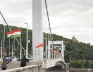 (240509) -- BUDAPEST, May 9, 2024 (Xinhua) -- Chinese and Hungarian national flags are seen hoisted in Budapest, Hungary, May 8, 2024. (Xinhua\/Zhang Fan