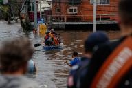 (240509) -- RIO GRANDE DO SUL, May 9, 2024 (Xinhua) -- Rescuers evacuate people affected by flood in Canoas, Rio Grande do Sul, Brazil, May 8, 2024. At least 100 people have died and nearly 100,000 homes have been destroyed or significantly damaged from more than a week of record rainfall and flooding in south Brazil\'s Rio Grande do Sul state, local authorities said on Wednesday. (Photo by Claudia Martini\/Xinhua
