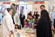 (240510) -- TEHRAN, May 10, 2024 (Xinhua) -- People visit the 35th Tehran International Book Fair in Tehran, Iran, on May 10, 2024. Nearly 2,700 publishers took part in the exhibition, which will continue until May 18. (Xinhua/Shadati