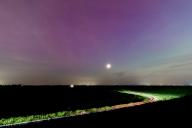(240511) -- OSSENISSE, May 11, 2024 (Xinhua) -- This photo taken on May 10, 2024 shows the northern lights in Ossenisse, the Netherlands. (Xinhua/Meng Dingbo