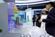 (240511) -- SHANGHAI, May 11, 2024 (Xinhua) -- Visitors view a model showcasing Hualong One nuclear power technology at the China General Nuclear Power Corporation booth during a China brands exposition of China Brand Day 2024 events in Shanghai, east China, May 11, 2024. The exposition is being held both online and offline. The offline segment covers an area of nearly 70,000 square meters, where exhibitors displayed a variety of technological innovation achievements and products, showcasing the image and strength of Chinese brands. Established in 2017, China Brand Day is celebrated on May 10 every year, and aims to increase society