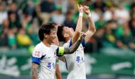 (240511) -- BEIJING, May 11, 2024 (Xinhua) -- Wang Jianan (R) of Meizhou Hakka celebrates with his teammates during the 11th round match between Beijing Guoan and Meizhou Hakka at the 2024 Chinese Super League (CSL) at Beijing Workers