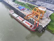 (240512) -- CHONGQING, May 12, 2024 (Xinhua) -- An aerial drone photo taken on May 11, 2024 shows the Innovation 5 vessel arriving at Jiangjin Luohuang Port in southwest China