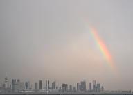 (240513) -- KUWAIT CITY, May 13, 2024 (Xinhua) -- A rainbow appears in the sky over Kuwait City, Kuwait, on May 13, 2024. (Photo by Asad/Xinhua