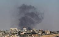 (240514) -- GAZA, May 14, 2024 (Xinhua) -- Smoke rises following Israeli strikes in the southern Gaza Strip city of Rafah, on May 14, 2024. Israeli tanks on Tuesday marched towards the center of Rafah, the southernmost city in the Gaza Strip, as tens of thousands of residents fled to evade an Israeli ground offensive, a local source reported. (Photo by Khaled Omar/Xinhua