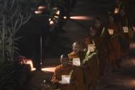 (240514) -- JAKARTA, May 14, 2024 (Xinhua) -- Buddhist monks carry water lanterns ahead of Vesak Day in Jakarta, Indonesia, on May 14, 2024. (Xinhua/Zulkarnain