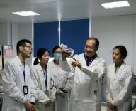 (240515) -- TIANJIN, May 15, 2024 (Xinhua) -- This photo taken in September 2023 shows Gao Wenyuan (2nd R), a professor at the School of Pharmaceutical Science and Technology, Tianjin University, leads his team to conduct a research at a lab in north China