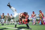 (240516) -- FUXIN, May 16, 2024 (Xinhua) -- Students practice Mongolian wrestling at a middle school in Fuxin Mongolian Autonomous County, northeast China
