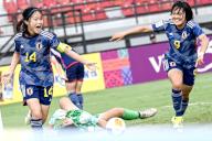 (240516) -- BALI, May 16, 2024 (Xinhua) -- Shinjo Miharu (L) of Japan celebrates scoring during the semifinal of AFC U-17 Women