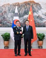 (240516) -- BEIJING, May 16, 2024 (Xinhua) -- Chinese State Councilor and Minister of Public Security Wang Xiaohong meets with Yoon Hee-keun, commissioner general of the Korean National Police Agency, in Beijing, capital of China, May 16, 2024. (Xinhua/Xie Huanchi