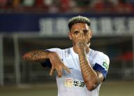(240517) -- ZHENGZHOU, May 17, 2024 (Xinhua) -- Pedro Henrique of Wuhan Three Towns FC celebrates scoring during the 12th round match between Henan FC and Wuhan Three Towns FC at the 2024 Chinese Super League (CSL) in Zhengzhou, central China