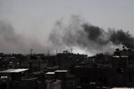 (240517) -- GAZA, May 17, 2024 (Xinhua) -- Smoke billows following Israeli strikes in Jabaliya refugee camp, northern Gaza Strip, on May 17, 2024. The Palestinian death toll from the ongoing Israeli attacks on the Gaza Strip has risen to 35,303, health authorities in the Palestinian enclave said in a press statement on Friday. (Photo by Abdul Rahman Salama/Xinhua