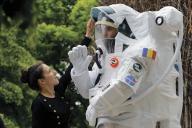 (240517) -- BUCHAREST, May 17, 2024 (Xinhua) -- A woman interacts with a man dressed as an astronaut during an Astrofest event marking the International Astronomy Day in Bucharest, Romania, on May 17, 2024. (Photo by Cristian Cristel/Xinhua
