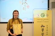 (240518) -- VALLETTA, May 18, 2024 (Xinhua) -- Elisabeth Van Nieuwamerongen poses with her certificate after winning Malta preliminary round of the 23rd "Chinese Bridge" Chinese proficiency competition at the University of Malta in Msida, Malta, May 17, 2024. TO GO WITH "Malta student wins Chinese competition, advances to global finals" (Photo by Jonathan Borg\/Xinhua