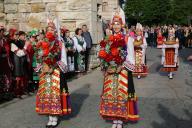 (240518) -- NESSEBAR, May 18, 2024 (Xinhua) -- Girls in folk costumes present flower baskets at the opening event of Bulgaria