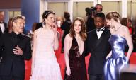 (240518) -- CANNES, May 18, 2024 (Xinhua) -- U.S. actress Emma Stone (C) leaves with fellow cast members after the screening of the film "Kinds of Kindness" at the 77th edition of the Cannes Film Festival in Cannes, southern France, on May 17, 2024. (Xinhua/Gao Jing