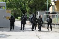 (240518) -- BRATISLAVA, May 18, 2024 (Xinhua) -- Police patrol outside the Specialised Criminal Court in Pezinok, Slovakia, May 18, 2024. The Specialised Criminal Court in Pezinok, Slovakia, has remanded in custody the man accused of the attempted murder of Prime Minister Robert Fico, court spokeswoman Katarina Kudjakova said on Saturday. The decision is not yet final, the spokeswoman was quoted by the News Agency of the Slovak Republic (TASR) as saying. (Xinhua/Wang Lili