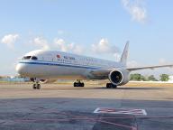 (240519) --BEIJING, May 19, 2024 (Xinhua) -- This photo taken on May 17, 2024 shows the first flight to resume air links between Cuba and China at the Jose Marti International Airport in Havana, Cuba. Local authorities said that the first flight to resume air links between Cuba and China arrived in Havana on Friday, with a stopover in Spain, which will enhance connectivity and facilitate exchanges between the two countries. (Xinhua/Lin Zhaohui