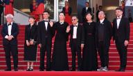 (240519) -- CANNES, May 19, 2024 (Xinhua) -- Chinese director Jia Zhangke (4th R) arrives with cast members at the red carpet before the premier of the film "Feng Liu Yi Dai (Caught by the Tides)" during the 77th edition of the Cannes Film Festival in Cannes, southern France, on May 18, 2024. (Xinhua\/Gao Jing