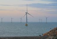 (240519) -- FUZHOU, May 19, 2024 (Xinhua) -- This photo taken on May 17, 2024 shows a wind farm off the coast of Pingtan County, southeast China