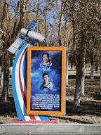 (240519) -- JIUQUAN, May 19, 2024 (Xinhua) -- This photo taken on Nov. 26, 2023 shows a poster about Chinese taikonauts in the Dongfeng Space City in northwest China. TO GO WITH "Letter from China: Exploring Space City in the Gobi Desert" (Xinhua/Jia Zhao