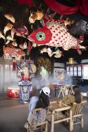 (240519) -- HUANGSHAN, May 19, 2024 (Xinhua) -- Visitors watch Anhui Opera in a fish-shaped lantern themed cafe in the Huizhou ancient town in Shexian County of Huangshan City, east China