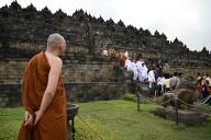 (240520) -- MAGELANG, May 20, 2024 (Xinhua) -- Buddhist monks descend the stairs after praying at Borobudur temple ahead of Vesak Day in Magelang, central Java, Indonesia, May 20, 2024. Vesak day will be celebrated on Thursday, May 23, this year. (Xinhua/Zulkarnain