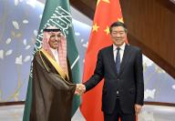 (240520) -- BEIJING, May 20, 2024 (Xinhua) -- Chinese Vice Premier He Lifeng, also a member of the Political Bureau of the Communist Party of China Central Committee, meets with Saudi Minister of Finance Mohammed bin Abdullah Al-Jadaan in Beijing, capital of China, May 20, 2024. (Xinhua/Yin Bogu