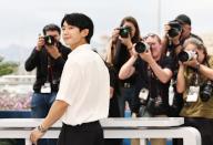(240520) -- CANNES, May 20, 2024 (Xinhua) -- Actor Jung Hae-In poses during a photocall for the film "Veteran 2" at the 77th Cannes Film Festival in Cannes, southern France, May 20, 2024. (Xinhua/Gao Jing
