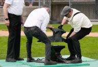 (240521) -- NEW WESTMINSTER, May 21, 2024 (Xinhua) -- Members of the Ancient and Honourable Hyack Anvil Battery put an anvil in place during the Victoria Day Anvil Battery Salute at Queen
