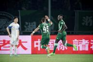 (240521) -- HANGZHOU, May 21, 2024 (Xinhua) -- Deabeas Owusu (R) of Zhejiang FC celebrates his goal with teammate Leonardo (C) during the 13th round match between Zhejiang FC and Wuhan Three Towns FC at the 2024 Chinese Super League (CSL) in Hangzhou, east China