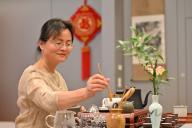 (240522) -- BERLIN, May 22, 2024 (Xinhua) -- A tea specialist performs tea art during a celebration of the International Tea Day at the China Culture Center in Berlin, Germany, May 21, 2024. (Xinhua/Ren Pengfei