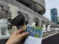 (240522) -- SHANGHAI, May 22, 2024 (Xinhua) -- An ice cream, a Shanghai Pass multipurpose prepaid travel card and proof of purchase are pictured at the Shanghai Museum in east China