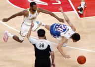 (240522) -- URUMQI, May 22, 2024 (Xinhua) -- Lindell Wigginton (R) of Xinjiang Flying Tigers vies with Kyle Fogg of Liaoning Flying Leopards during the play-off final 4th leg match at the 2023-2024 season of the Chinese Basketball Association (CBA) league in Urumqi, northwest China