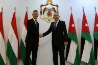(240522) -- AMMAN, May 22, 2024 (Xinhua) -- Jordanian Foreign Minister Ayman Safadi (R) shakes hands with Hungarian Minister of Foreign Affairs and Trade Peter Szijjarto during their meeting in Amman, Jordan, on May 22, 2024. Jordanian Foreign Minister Ayman Safadi said on Wednesday the situation in the West Bank was worsening, blaming Israel