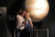 (240525) -- BRUSSELS, May 25, 2024 (Xinhua) -- Visitors pose for selfies at Planetarium of the Royal Observatory of Belgium in Brussels, Belgium, May 23, 2024. More than 40 museums in Brussels and surrounding areas opened to the public in batches on 7 Thursday nights from April 11 to May 23. (Photo by Liu Zihe/Xinhua