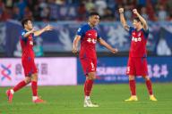 (240525) -- WUHAN, May 25, 2024 (Xinhua) -- Darick Kobie Morris (C) of Meizhou Hakka celebrates after the 14th round match between Wuhan Three Towns FC and Meizhou Hakka at the 2024 Chinese Super League (CSL) in Wuhan, central China