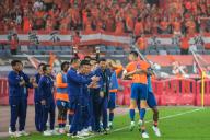 (240525) -- JINAN, May 25, 2024 (Xinhua) -- Members of Shangdong Taishan celebrate scoring during the 14th round match between Shangdong Taishan and Zhejiang FC at the 2024 Chinese Super League (CSL) in Jinan, east China